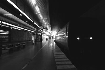 Train at railroad station at night