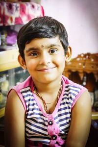 Portrait of smiling girl at home