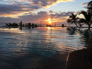 Scenic view of sea at sunset