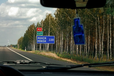 Road seen through car windshield