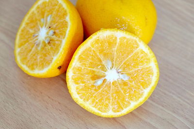 Close-up of orange slices on table