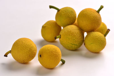 Close-up of fruits against white background