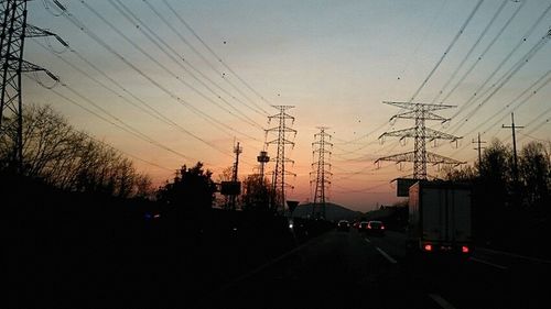 Electricity pylon at sunset