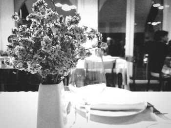 Close-up of flower vase on table