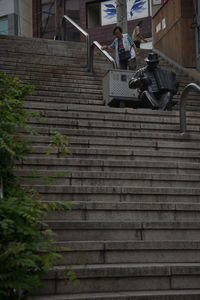 Low section of people on staircase