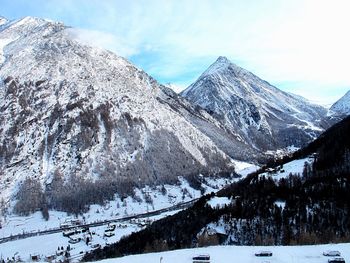 Scenic view of snow covered mountains