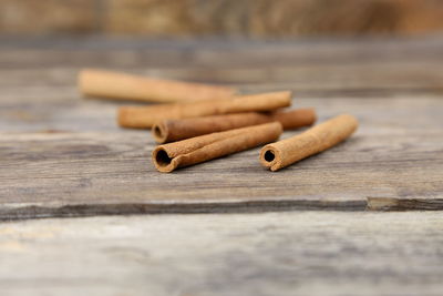 Close-up of cinnamons on table