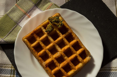 High angle view of cake in plate on table