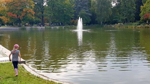 Woman standing in lake