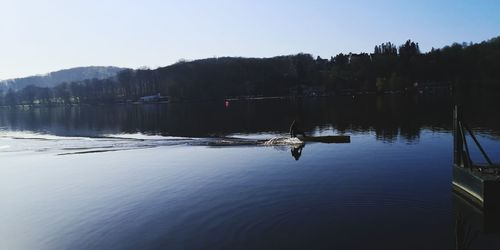 Scenic view of lake against clear sky