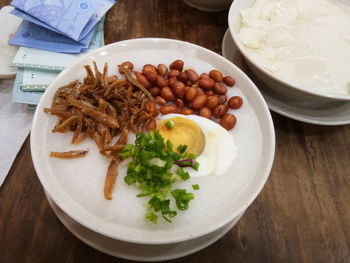 High angle view of breakfast served on table