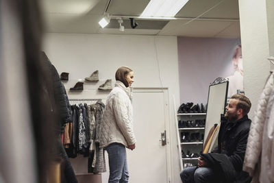 Young couple in clothes shop