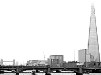 City skyline with bridge in background