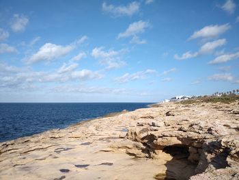 Scenic view of beach against sky