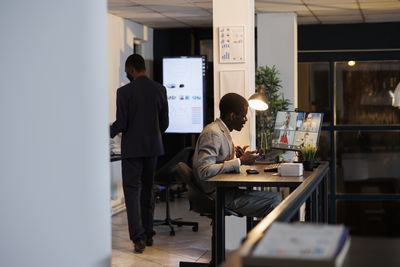 Business colleagues working in office