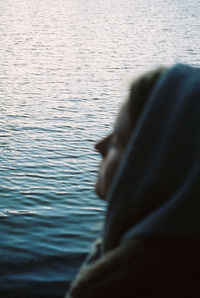 Portrait of woman in  front of a lake