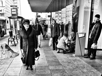 Portrait of men in city