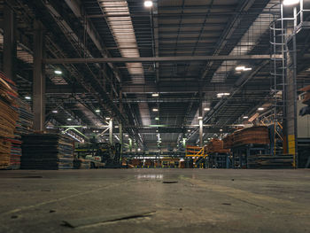 Low angle view of illuminated industry in building