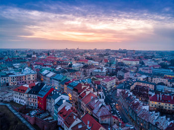 High angle view of cityscape against sky during sunset