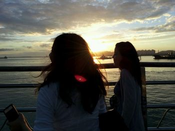 Scenic view of sea against sky at sunset