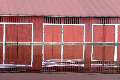 Building reflecting on lake