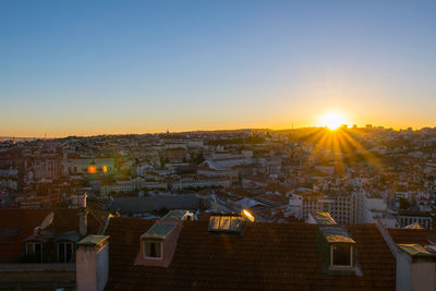 High angle view of cityscape at sunset