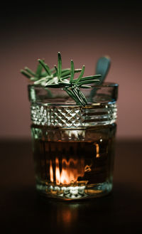 Close-up of beer glass on table