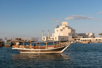 Dhow moored at museum of islamic art doha, qatar 