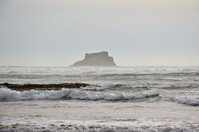 Scenic view of sea against clear sky