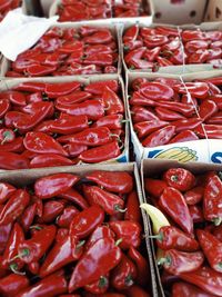 High angle view of red peppers for sale at market stall