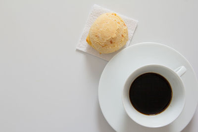 Close-up of coffee cup on table