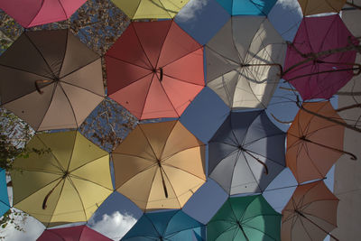 Low angle view of multi colored umbrellas