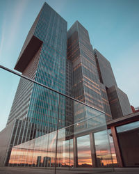 Low angle view of modern buildings against clear sky