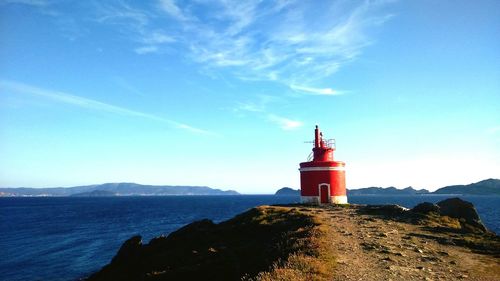 Lighthouse against blue sky