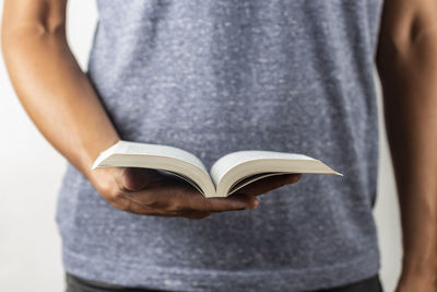 Close-up of woman holding book