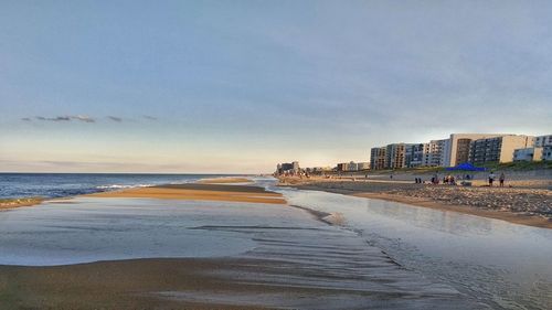 View of beach against sky during sunset