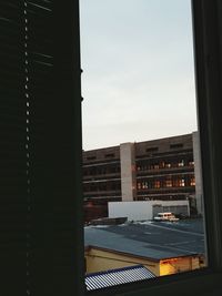 Buildings in city against sky