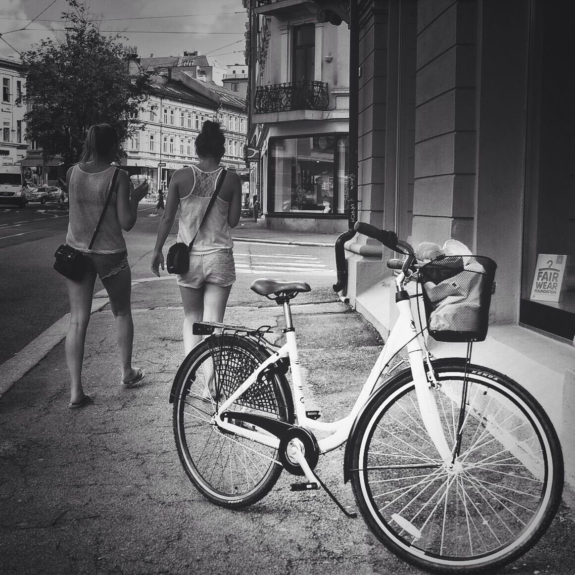 bicycle, mode of transport, transportation, building exterior, land vehicle, architecture, built structure, street, stationary, parking, parked, city, men, city life, cobblestone, day, travel, sidewalk