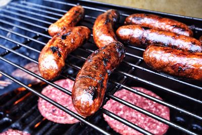 Close-up of meat on barbecue grill