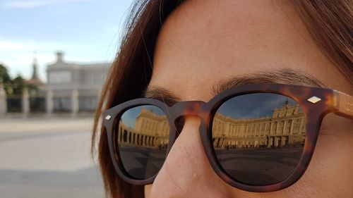 Close-up of young woman in sunglasses