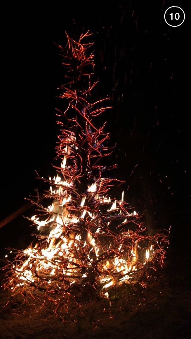 night, illuminated, long exposure, glowing, celebration, motion, firework display, fire - natural phenomenon, exploding, sparks, firework - man made object, burning, blurred motion, dark, light - natural phenomenon, lighting equipment, outdoors, low angle view, flame, no people