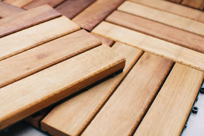 Close-up of wooden planks at carpentry workshop