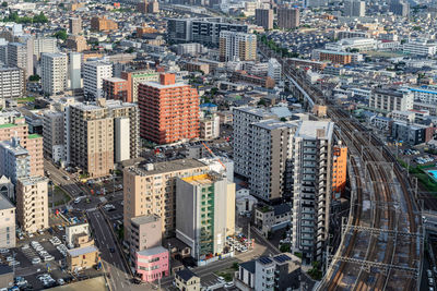 High angle view of modern buildings in city