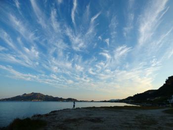 Scenic view of sea against sky at sunset