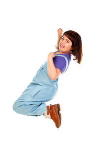 Side view of a smiling girl over white background