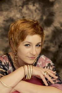 Close-up portrait of smiling young woman