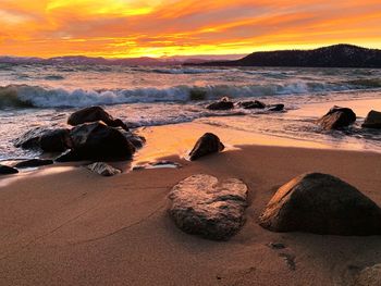 Scenic view of sea against sky during sunset