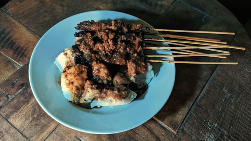 High angle view of meat in plate on table