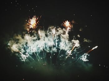 Firework display at night