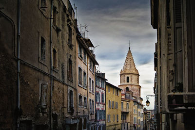 Low angle view of old building against sky